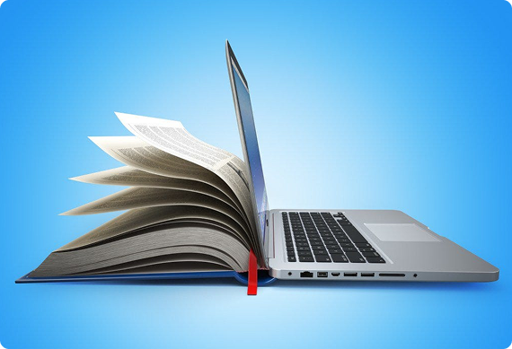 Open book merging into a laptop